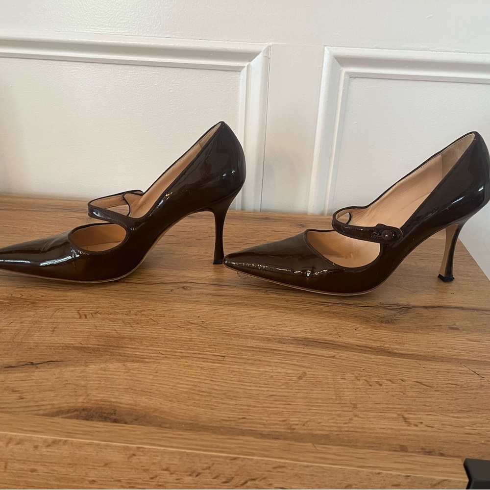 Manolo Blahnik. Brown patent Mary Jane’s. 3 inch heels. Gently worn.